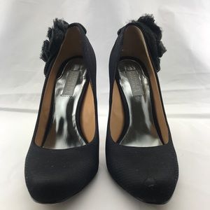 Badgley Mischka black heels with flower accent